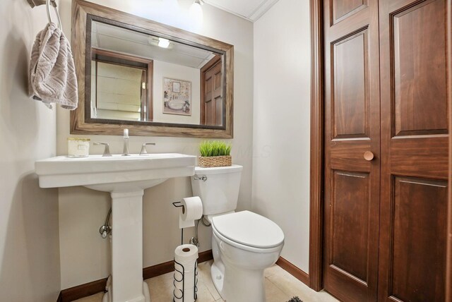 1012 Lake Fork Rd, Utica, OH 43080 - half bath with toilet, baseboards, and tile patterned flooring