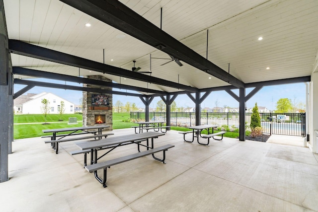 surrounding community featuring a yard, a patio, and fence