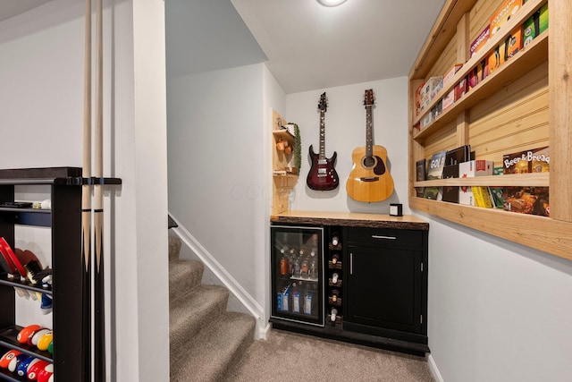 1479 Brookforest Dr, Columbus, OH 43204 - interior space with baseboards, carpet flooring, and a dry bar
