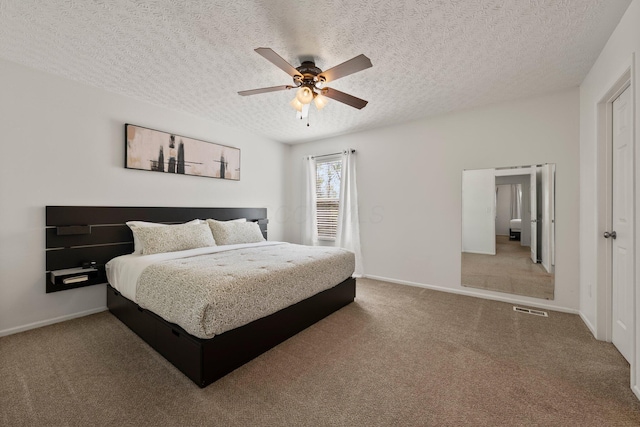 1479 Brookforest Dr, Columbus, OH 43204 - carpeted bedroom featuring visible vents, a textured ceiling, and baseboards