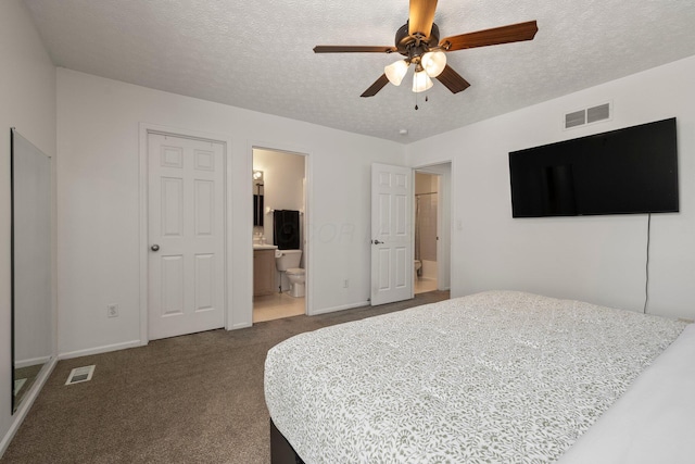 1479 Brookforest Dr, Columbus, OH 43204 - bedroom featuring a textured ceiling, visible vents, and dark carpet
