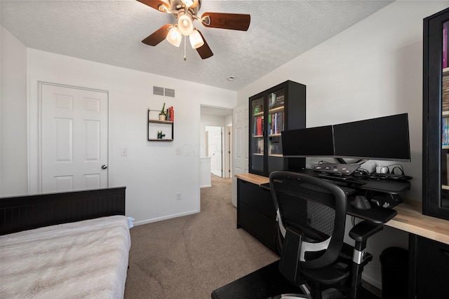 1479 Brookforest Dr, Columbus, OH 43204 - bedroom featuring visible vents, baseboards, ceiling fan, a textured ceiling, and carpet