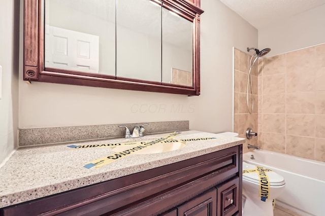 3861 Trestle Ct, Columbus, OH 43204 - bathroom with toilet, vanity, and shower / tub combination