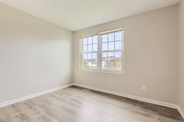 3861 Trestle Ct, Columbus, OH 43204 - spare room featuring wood finished floors and baseboards
