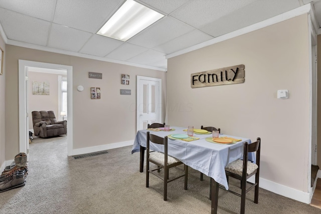 1227 E Chestnut St, Lancaster, OH 43130 - carpeted dining area with visible vents, ornamental molding, baseboards, and a drop ceiling