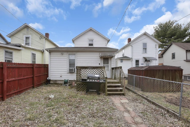1227 E Chestnut St, Lancaster, OH 43130 - back of property with a deck and a fenced backyard