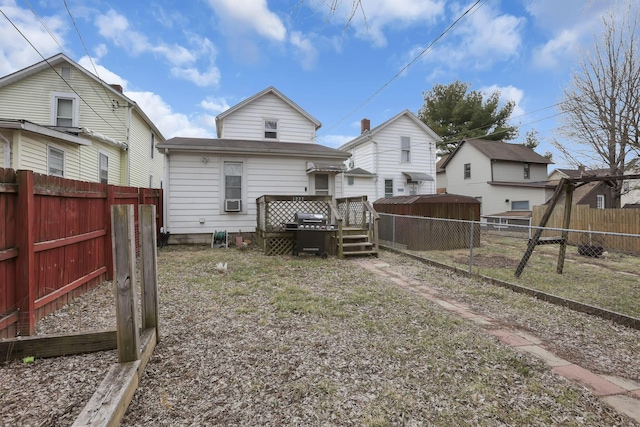 1227 E Chestnut St, Lancaster, OH 43130 - rear view of property with a fenced backyard and a wooden deck