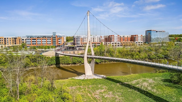 surrounding community featuring a water view and a view of city