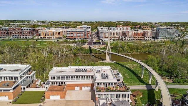 drone / aerial view of a notable bridge and a large body of water