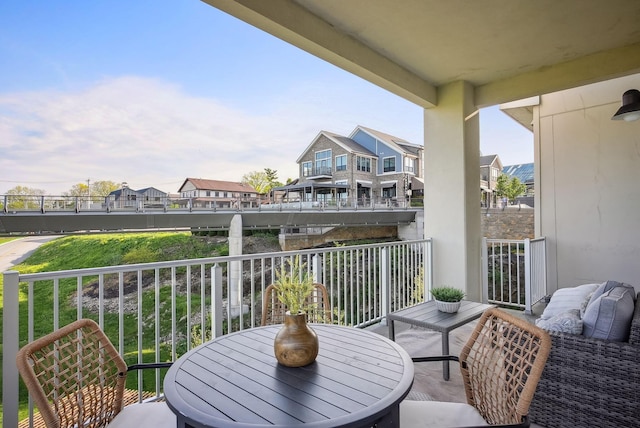 balcony featuring a residential view