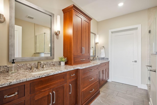 bathroom featuring double vanity