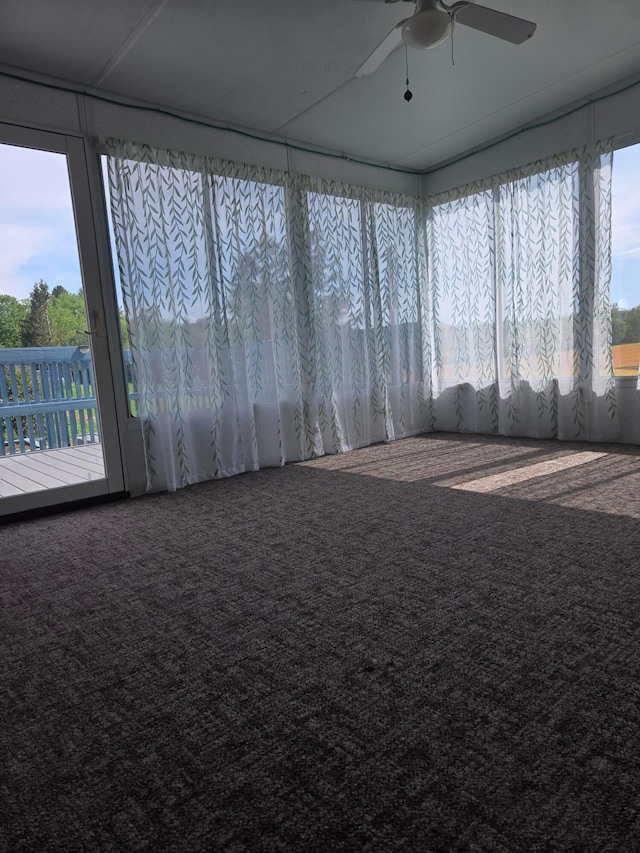 unfurnished sunroom featuring a healthy amount of sunlight