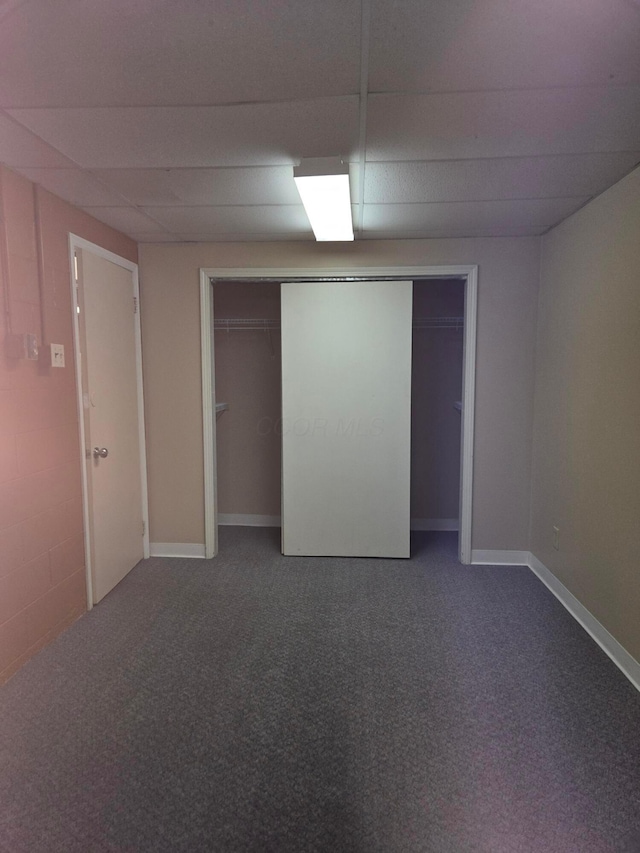 finished basement featuring carpet flooring