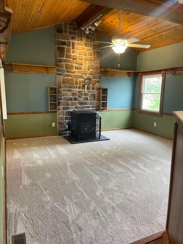 10519 Darby Creek Rd, Orient, OH 43146 - unfurnished living room with wooden ceiling, wainscoting, a ceiling fan, carpet floors, and track lighting