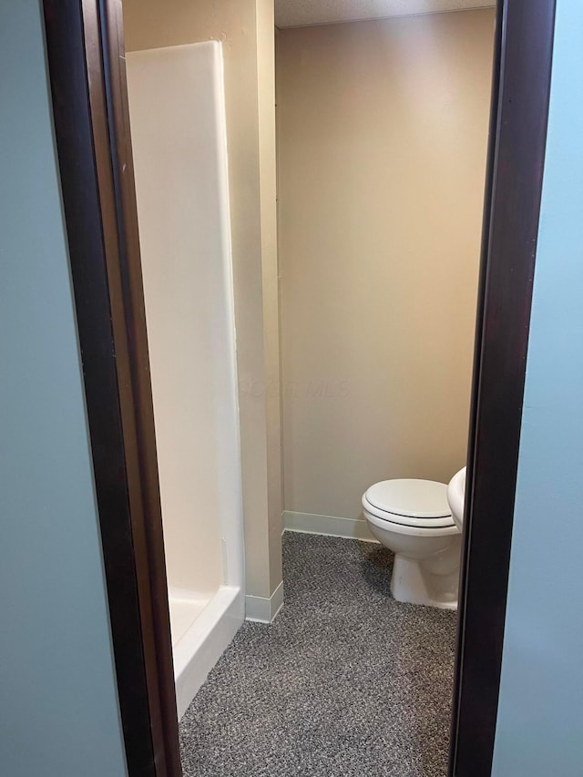10519 Darby Creek Rd, Orient, OH 43146 - full bath with toilet, a stall shower, and baseboards