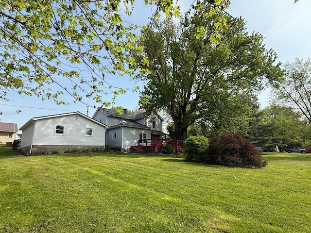 view of yard featuring a deck