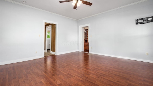 219 W Sheridan Ave, Somerset, OH 43783 - spare room featuring a ceiling fan, ornamental molding, baseboards, and dark wood-type flooring