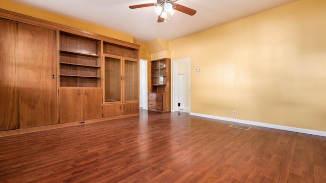 219 W Sheridan Ave, Somerset, OH 43783 - unfurnished room featuring a ceiling fan, baseboards, and dark wood-type flooring