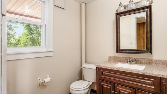 219 W Sheridan Ave, Somerset, OH 43783 - bathroom with toilet and vanity