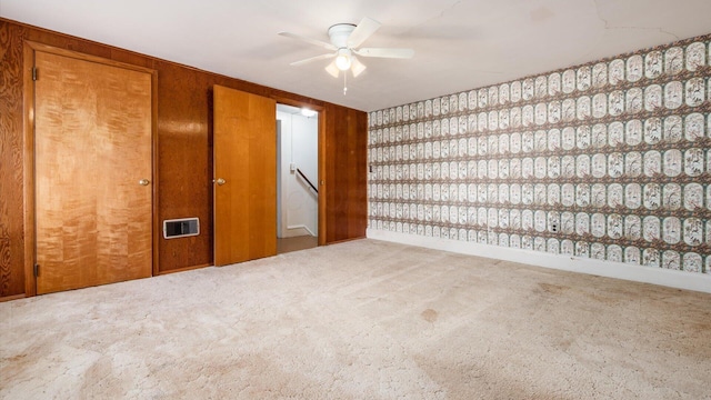 219 W Sheridan Ave, Somerset, OH 43783 - carpeted empty room with baseboards and ceiling fan