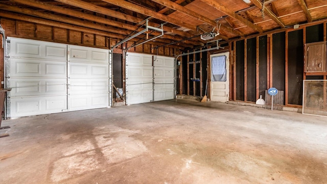 219 W Sheridan Ave, Somerset, OH 43783 - garage with a garage door opener