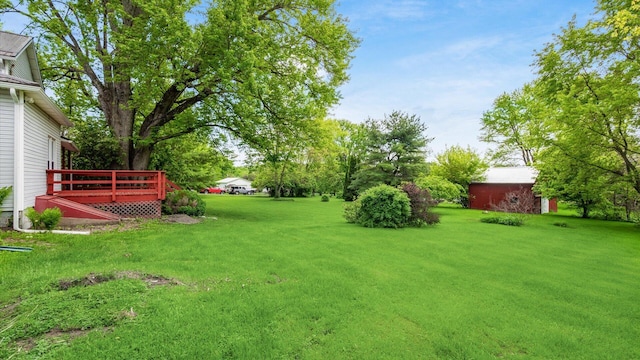 219 W Sheridan Ave, Somerset, OH 43783 - view of green lawn featuring a deck