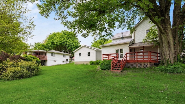 219 W Sheridan Ave, Somerset, OH 43783 - view of green lawn featuring a deck