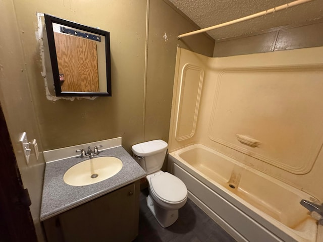 bathroom with vanity, toilet, a textured ceiling, and  shower combination