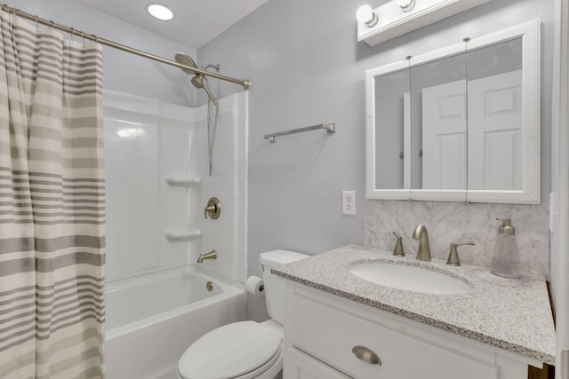 full bath featuring backsplash, shower / bath combo with shower curtain, toilet, and vanity