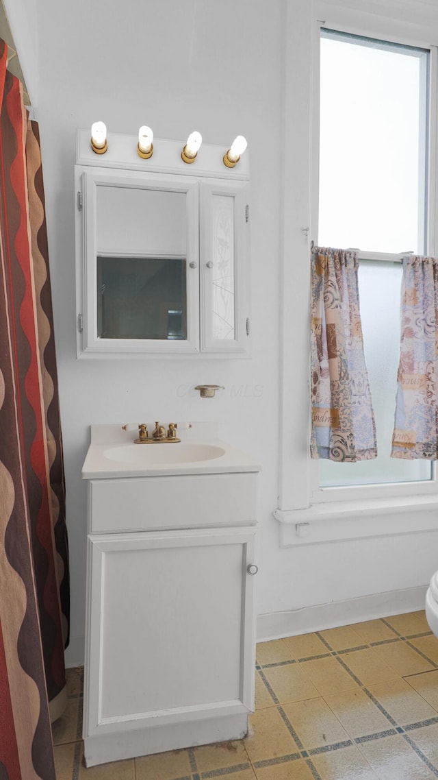 74 S Chester St, West Jefferson, OH 43162 - bathroom featuring vanity and a shower with curtain