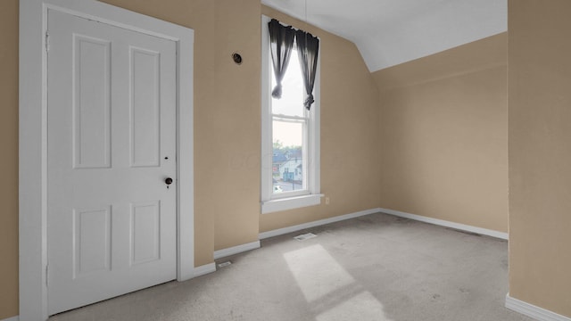 74 S Chester St, West Jefferson, OH 43162 - interior space with plenty of natural light, carpet flooring, baseboards, and lofted ceiling