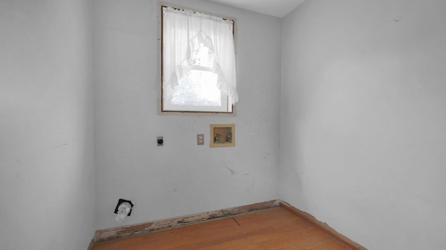 74 S Chester St, West Jefferson, OH 43162 - clothes washing area with laundry area, baseboards, electric dryer hookup, light wood-style flooring, and washer hookup