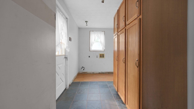 74 S Chester St, West Jefferson, OH 43162 - corridor with dark tile patterned floors
