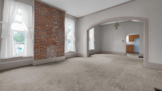 74 S Chester St, West Jefferson, OH 43162 - spare room featuring crown molding, carpet flooring, baseboards, and arched walkways