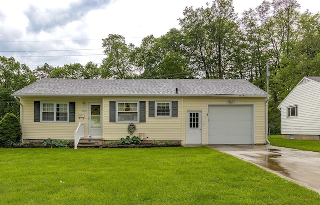 1234 E Fair Ave, Lancaster, OH 43130 - ranch-style home with concrete driveway, roof with shingles, an attached garage, and a front yard