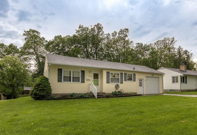 1234 E Fair Ave, Lancaster, OH 43130 - ranch-style home featuring a front yard, entry steps, an attached garage, and driveway