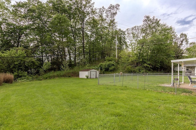 1234 E Fair Ave, Lancaster, OH 43130 - view of yard with fence, a shed, and an outdoor structure
