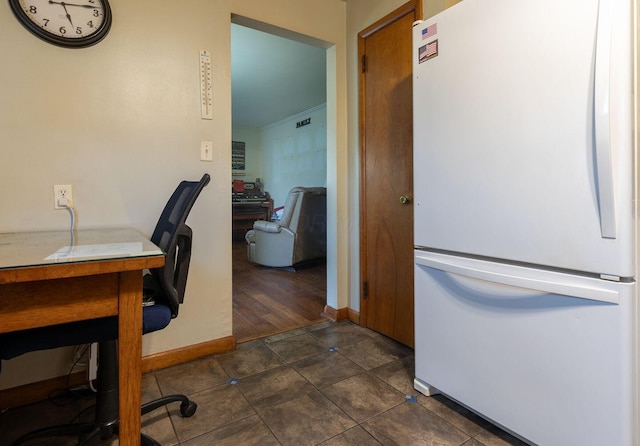 1234 E Fair Ave, Lancaster, OH 43130 - home office featuring baseboards and dark tile patterned flooring