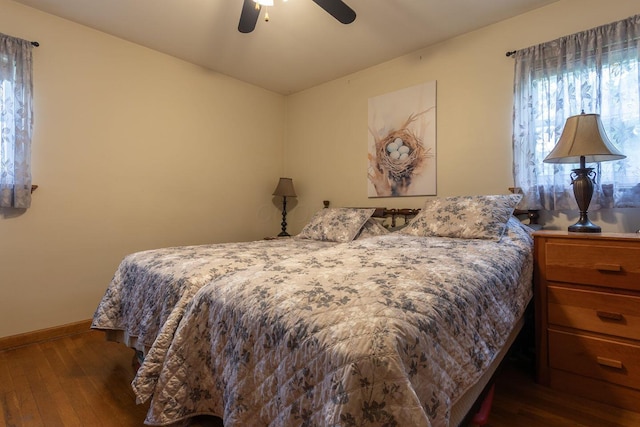 1234 E Fair Ave, Lancaster, OH 43130 - bedroom featuring baseboards, vaulted ceiling, a ceiling fan, and hardwood / wood-style flooring