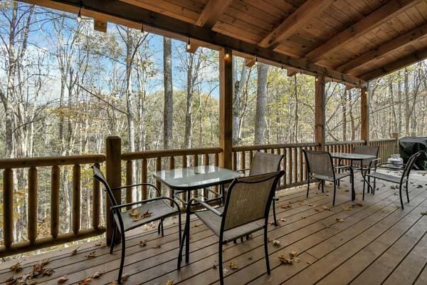 deck with outdoor dining area