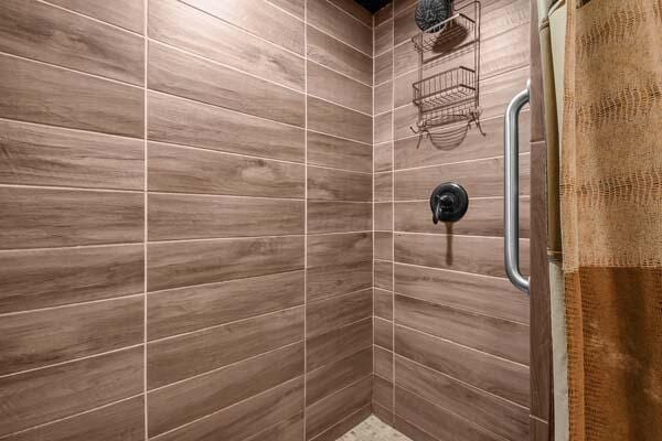 bathroom with a stall shower