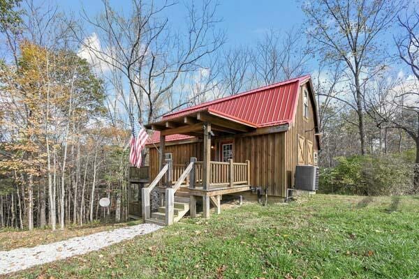 rustic home with central AC and metal roof