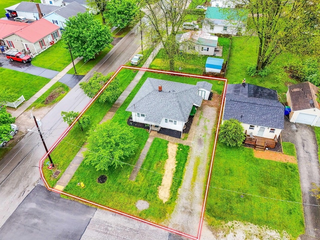 aerial view of residential area featuring property parcel outlined