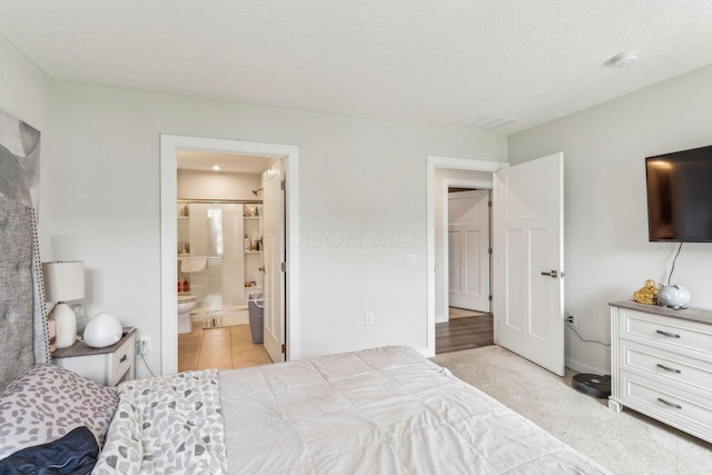 bedroom with ensuite bathroom