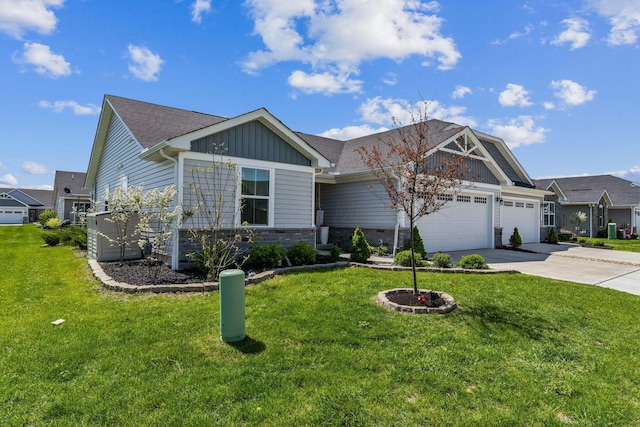 craftsman-style home featuring a garage, a front lawn, board and batten siding, and driveway