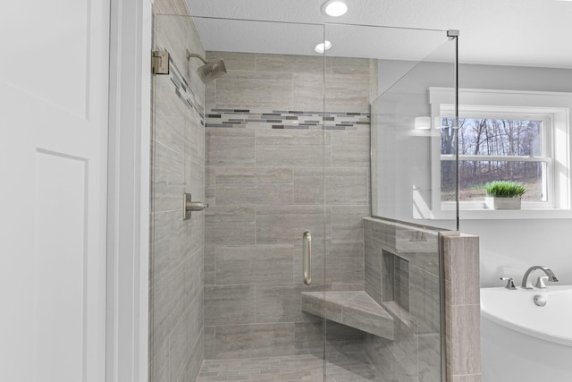 10695 State Route 93 N, Logan, OH 43138 - bathroom with a stall shower and a soaking tub