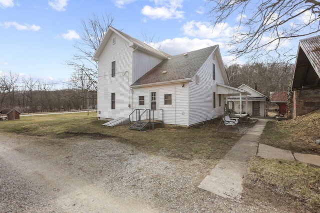 10695 State Route 93 N, Logan, OH 43138 - view of property exterior featuring a shingled roof