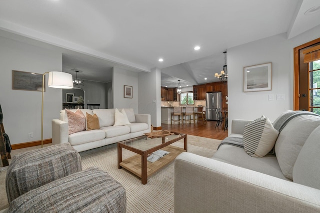 1920 Chatfield Rd, Columbus, OH 43221 - living area with a chandelier, wood finished floors, recessed lighting, and baseboards