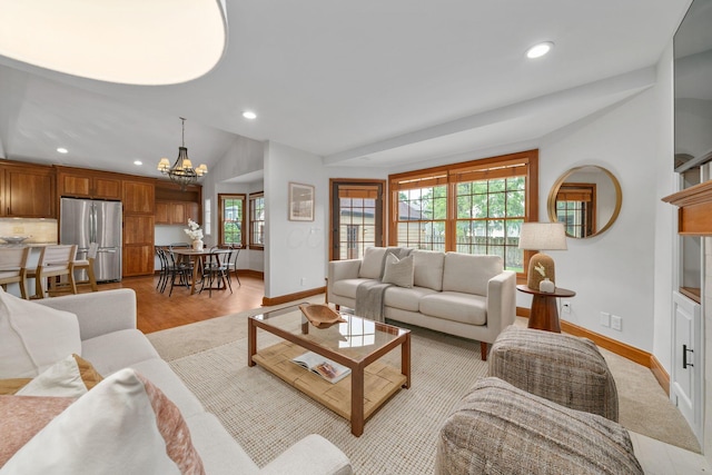 1920 Chatfield Rd, Columbus, OH 43221 - living area with baseboards, recessed lighting, a chandelier, light wood-style flooring, and lofted ceiling