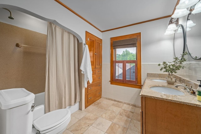 1920 Chatfield Rd, Columbus, OH 43221 - bathroom with tile walls, double vanity, shower / bathtub combination with curtain, ornamental molding, and toilet